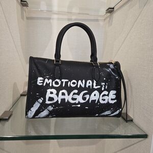 Stylish Black Crossbody Bag with White Accents